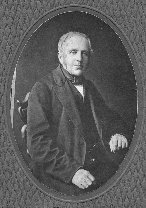 Bernhard Harder, Sr. (1811-1900) photographed in Wichita in the studio of Nereus Baldwin, 118 East Douglas Avenue (Second floor).  The insignia on the photograph frame is "Baldwin Photos." The date of photo would be  after 1876 and presumably before 1886 when the studio became N. Baldwin and Son. (Melvin Epp)<A HREF=#N_2_><sup>(2)</SUP></A>